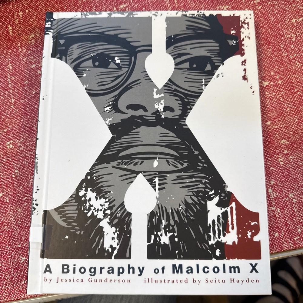A Biography of Malcolm X Jessica Gunderson Graphic Novel Capstone Press HC